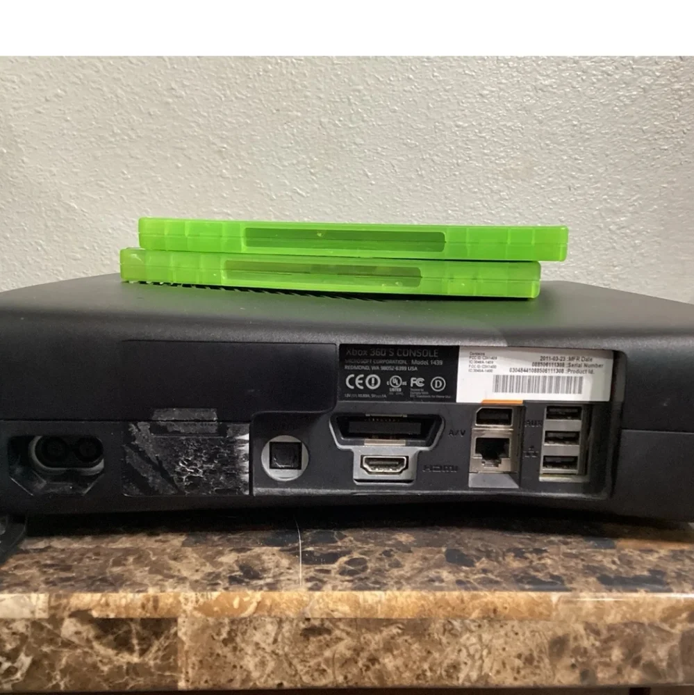 Microsoft Xbox 360 Game Console Bundle 4GB, Power Cord, Controller, and 2 games.